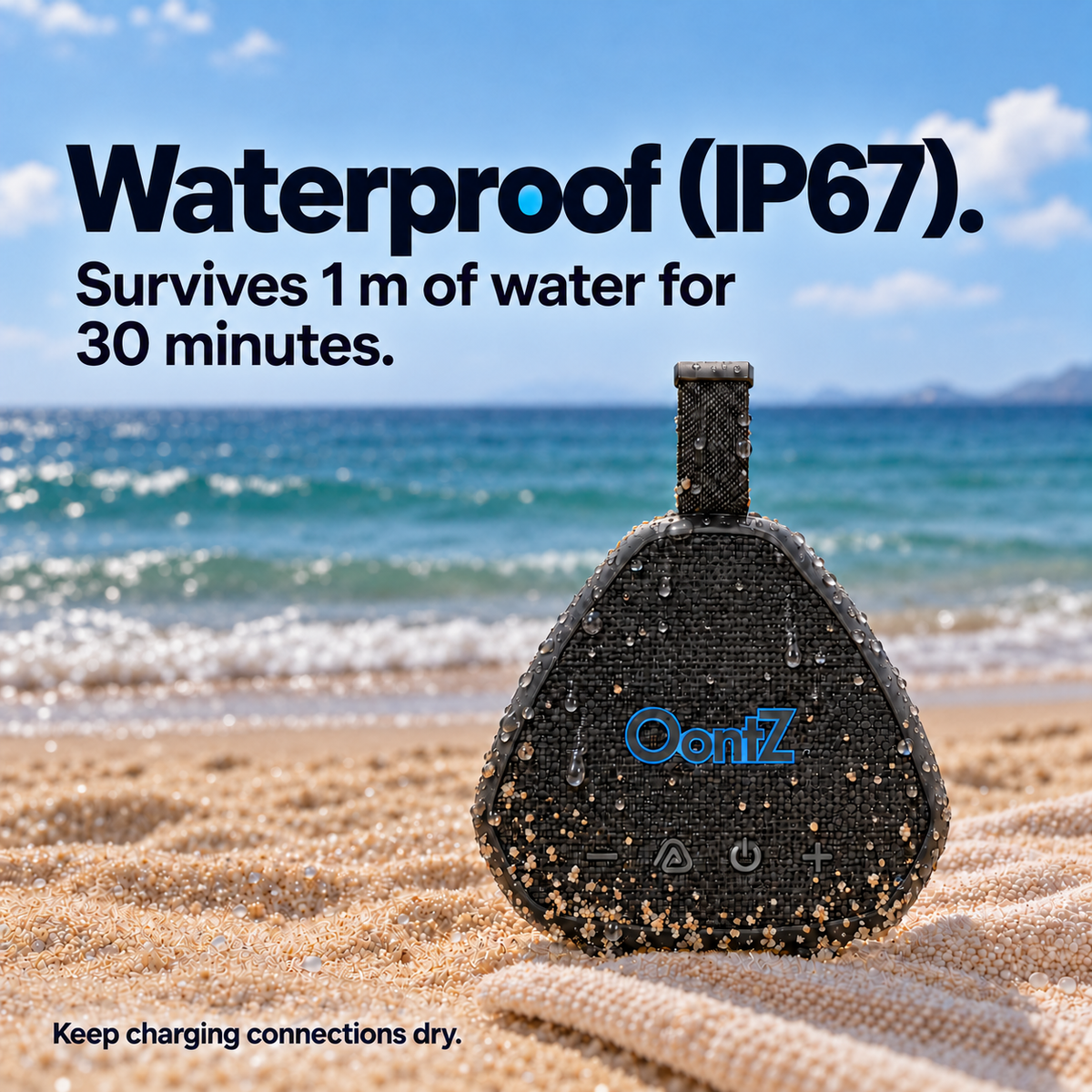 Black OontZ Angle Solo Gen 5 on a beach, with visible water droplets and sand on its exterior. IP67 dust and water resistance; keep charging connections dry. AI lifestyle illustration.